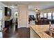 Open-concept living area flows seamlessly from the kitchen to the cozy seating area at 2359 Brynfield Cv, Suwanee, GA 30024