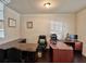 Well-lit office area with large desks, comfortable seating, and ample workspace at 2359 Brynfield Cv, Suwanee, GA 30024