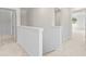 Upstairs hallway features white carpet, doorframes, and baseboards at 984 Sutherland Ln (Lot 31), Lawrenceville, GA 30043