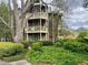 Apartment building with multiple balconies and green landscaping at 1101 Mcgill Park Ne Ave # 1101, Atlanta, GA 30312