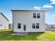 Beautiful backyard with a lush lawn and a view of the two-story home at 204 Groveton Ct, Euharlee, GA 30145