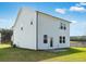 Well-maintained backyard with lush green lawn and white siding house at 204 Groveton Ct, Euharlee, GA 30145