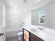 Well-lit bathroom features a tub-shower combo and a vanity at 204 Groveton Ct, Euharlee, GA 30145
