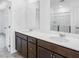 Bathroom featuring double sinks and a shower enclosure at 204 Groveton Ct, Euharlee, GA 30145