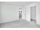 Bright bedroom with carpet flooring and an ensuite closet at 204 Groveton Ct, Euharlee, GA 30145