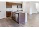 Close up of kitchen island featuring a stainless steel dishwasher and granite countertop at 204 Groveton Ct, Euharlee, GA 30145