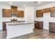Well-equipped kitchen with granite countertops, stainless steel appliances, and ample cabinet space at 204 Groveton Ct, Euharlee, GA 30145
