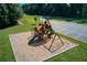 View of a community playground with multiple slides and swings on a mulch base at 4015 Sierra Vista Cir, Cumming, GA 30028