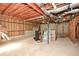 Unfinished basement featuring exposed wood beams, concrete walls and floors, and visible ductwork, offering customizable space at 581 Victorian Cir, Dallas, GA 30157