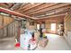 Spacious unfinished basement with exposed ceiling and framing, perfect for storage or renovation at 581 Victorian Cir, Dallas, GA 30157