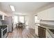 Eat-in kitchen features stainless appliances, granite countertops and dining area at 581 Victorian Cir, Dallas, GA 30157