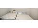 A laundry room featuring a washing machine and dryer at 581 Victorian Cir, Dallas, GA 30157