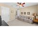 Spare bedroom featuring neutral walls, closet space, and comfortable seating for relaxation at 602 Kenion Forest Way, Lilburn, GA 30047