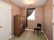 Cozy bedroom with carpet, a window with curtains, and a spacious closet at 608 Ridge Crossing Dr, Woodstock, GA 30189