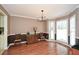 Elegant dining room featuring hardwood floors and large windows for natural light at 608 Ridge Crossing Dr, Woodstock, GA 30189