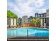 Resort-style pool area with lounge chairs, water feature, and well-maintained landscaping, perfect for relaxation and recreation at 625 Piedmont Ne Ave # 3028, Atlanta, GA 30308