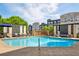 Resort-style pool area with lounge chairs, water feature, and well-maintained landscaping, perfect for relaxation and recreation at 625 Piedmont Ne Ave # 3028, Atlanta, GA 30308