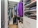 Organized walk-in closet with custom shelving and ample storage space for clothes and accessories at 625 Piedmont Ne Ave # 3028, Atlanta, GA 30308