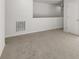 Neutral loft space showcasing carpeting and a pristine white wall with access to an upper level at 72 Hampton Ter, Dallas, GA 30157