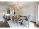 Elegant dining space with stylish furniture and trim, adjacent to a contemporary kitchen at 1074 Fairway Ne Ests, Atlanta, GA 30319