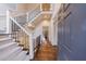 Welcoming entryway with hardwood floors and an elegant staircase at 1074 Fairway Ne Ests, Atlanta, GA 30319