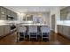 Gorgeous kitchen features large island, white countertops, pendant lighting and stainless appliances at 1074 Fairway Ne Ests, Atlanta, GA 30319