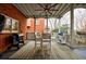 Covered patio featuring a ceiling fan, white table and chairs, and a barbecue grill at 1074 Fairway Ne Ests, Atlanta, GA 30319