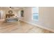 Bedroom featuring hardwood floors, lots of natural light, and an ensuite bathroom at 1748 Alvarado Sw Ter, Atlanta, GA 30310