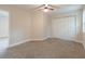 Bedroom with carpeted floor, ceiling fan, and closet at 1748 Alvarado Sw Ter, Atlanta, GA 30310