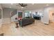 Bright and open living room with hardwood floors and neutral paint leads into a modern kitchen area at 1748 Alvarado Sw Ter, Atlanta, GA 30310