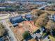 Aerial view shows the layout of new townhomes with green spaces and nearby amenities at 310 Mcdonough Se Blvd # 101, Atlanta, GA 30315