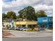 View of commercial properties with parking and landscaping at 310 Mcdonough Se Blvd # 101, Atlanta, GA 30315