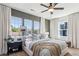 Bedroom featuring large windows, a ceiling fan, and neutral-toned furniture and decor at 310 Mcdonough Se Blvd # 101, Atlanta, GA 30315