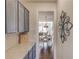 Hallway view of an eat-in kitchen with tile backsplash at 3538 Lily Magnolia Ct, Buford, GA 30519