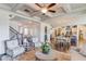 Open concept living room featuring hardwood floors, fireplace and coffered ceilings at 3538 Lily Magnolia Ct, Buford, GA 30519