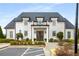 Charming clubhouse with beautiful landscaping, elegant entrance, and ample parking at 5229 Noble Village Way, Lilburn, GA 30047