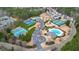 Aerial view of community tennis courts and swimming pool at 916 Santa Anita Dr, Woodstock, GA 30189