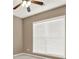 Bedroom with neutral walls, ceiling fan, and a window with blinds at 916 Santa Anita Dr, Woodstock, GA 30189