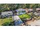 Aerial view of the home, showcasing its landscaped yard, mature trees, and location within the neighborhood at 1270 Graymont Sw Dr, Atlanta, GA 30310