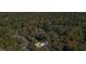 An aerial view of a home surrounded by lush, mature trees in a serene, wooded neighborhood at 1270 Graymont Sw Dr, Atlanta, GA 30310