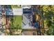 Birds eye view of a home's yard, roof, neighborhood, and surrounding trees in a suburban location at 1270 Graymont Sw Dr, Atlanta, GA 30310