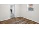 Bedroom with wood floors, large windows, and views to the outside at 1270 Graymont Sw Dr, Atlanta, GA 30310