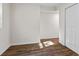 Bedroom with wood floors, closet, and large windows for natural light at 1270 Graymont Sw Dr, Atlanta, GA 30310