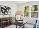 Bright living room features natural light from multiple windows and stylish furnishings at 1270 Graymont Sw Dr, Atlanta, GA 30310