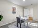 Bright office with neutral walls and carpet, features white desk and views of the exterior at 1270 Graymont Sw Dr, Atlanta, GA 30310