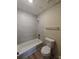 Renovated bathroom featuring a tiled shower, neutral paint, and new fixtures at 1625 Conley Rd # 171, Conley, GA 30288