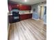 Modern kitchen featuring wood floors, neutral paint, and updated cabinets at 1625 Conley Rd # 171, Conley, GA 30288