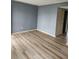 Living room boasting wood floors, neutral paint, and plenty of space to relax and entertain at 1625 Conley Rd # 171, Conley, GA 30288