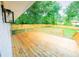 Back deck overlooking a fenced backyard, perfect for entertaining at 1975 Glenmar Dr, Decatur, GA 30032
