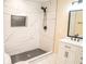 Refinished bathroom featuring a tiled shower, modern vanity, and stylish fixtures at 1975 Glenmar Dr, Decatur, GA 30032